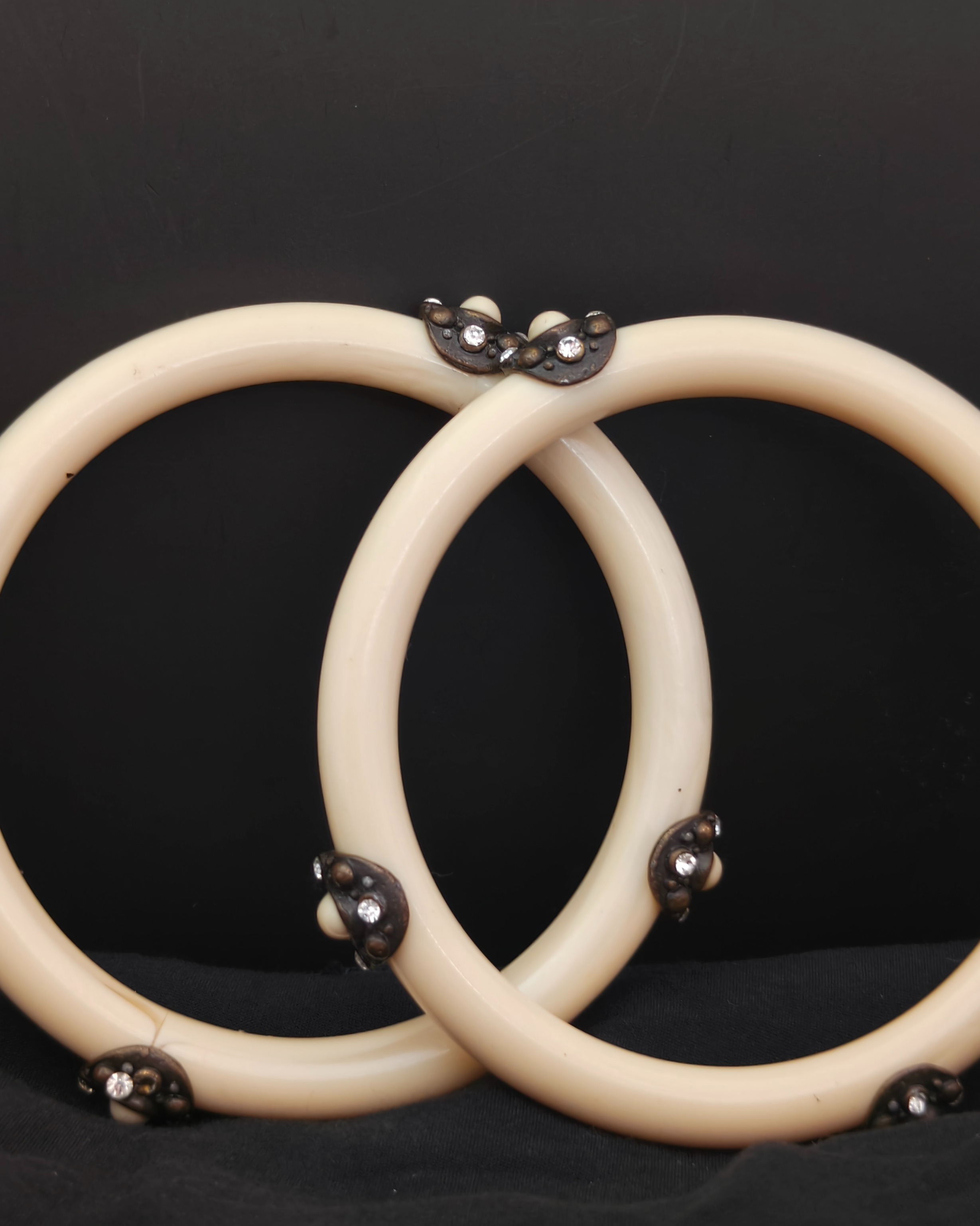Pair of vintage ivory-colored bracelets with crystals