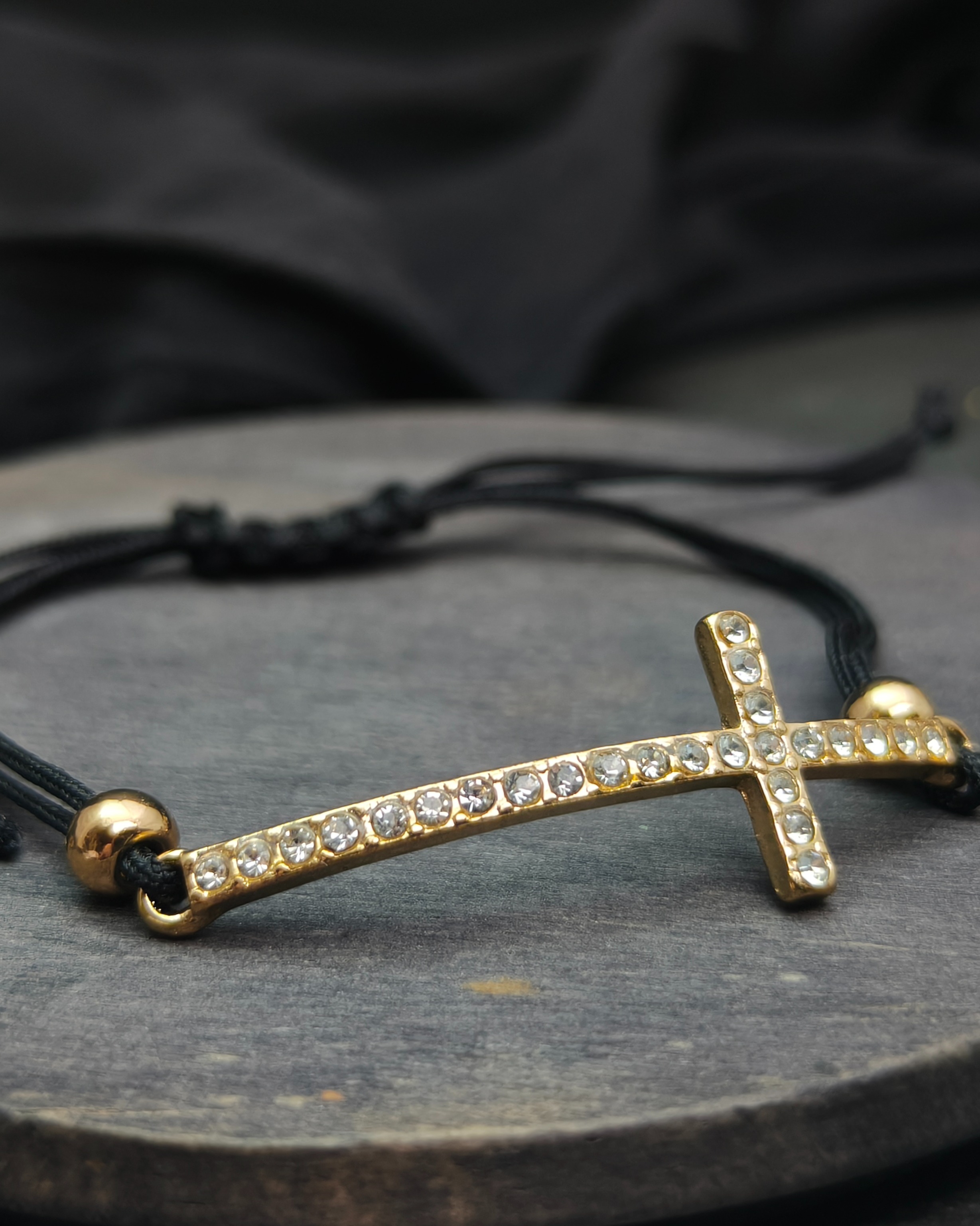 Bracelet with golden cross and rhinestones