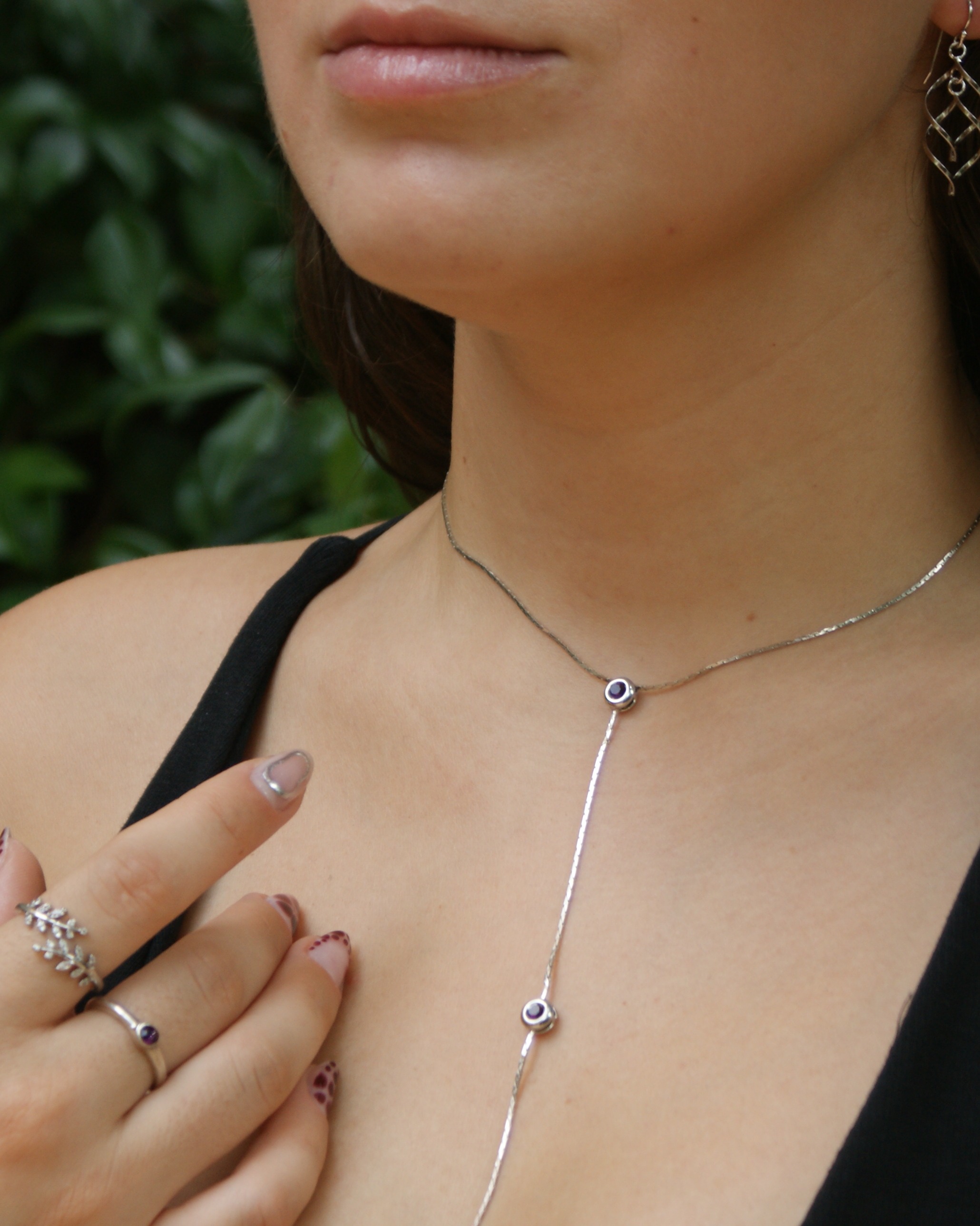 Lariat necklace with purple cubic zirconia