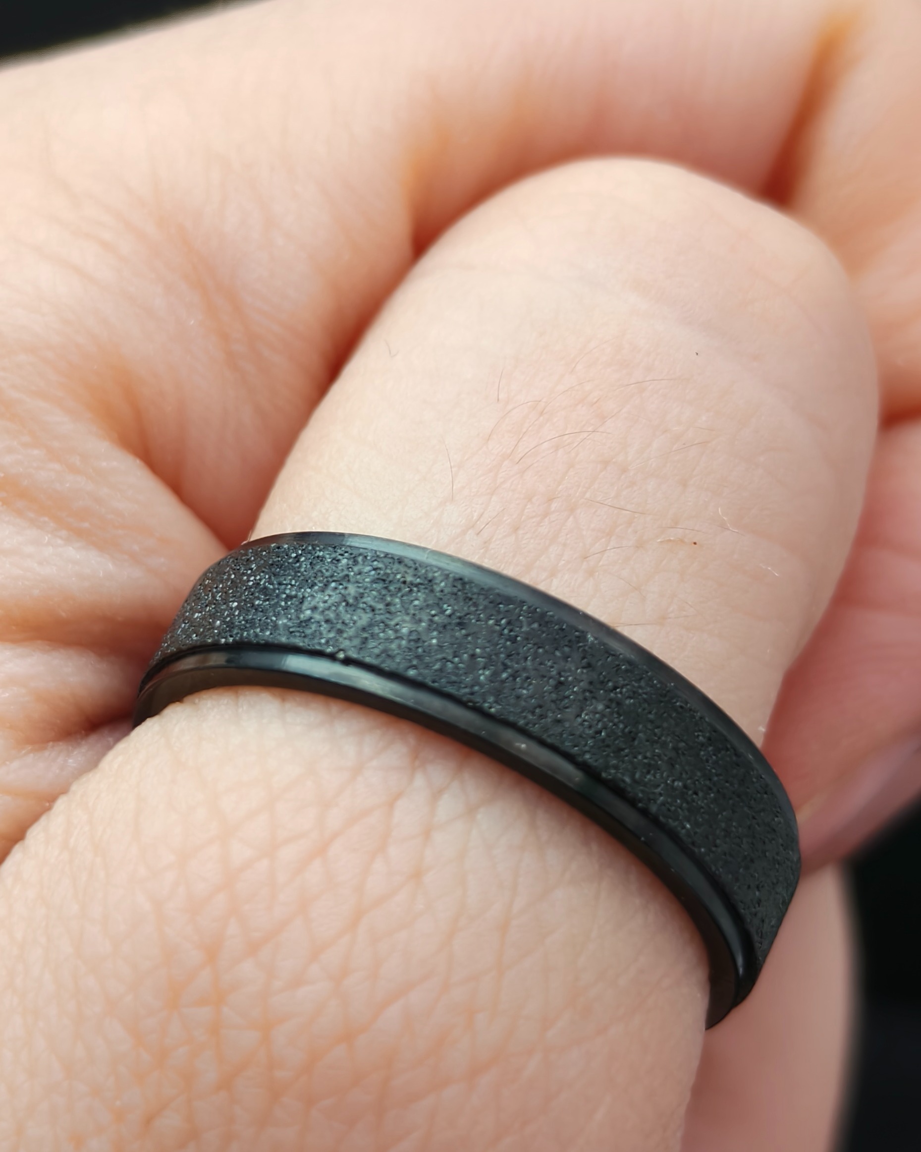 Black ring with glitter (alternate view)