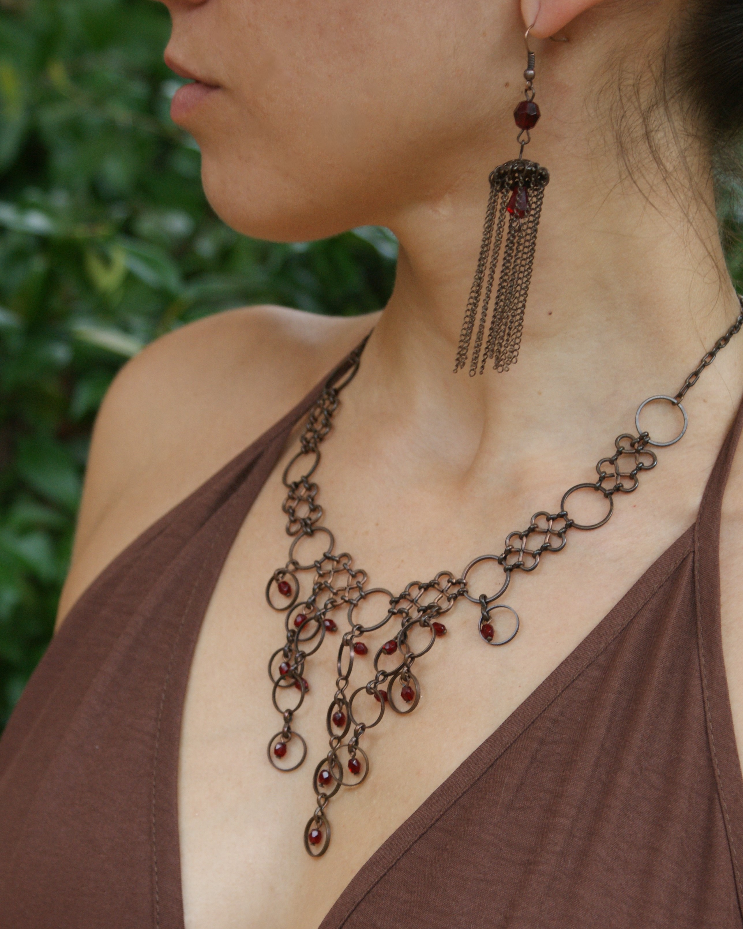 Set of choker and earrings in aged copper