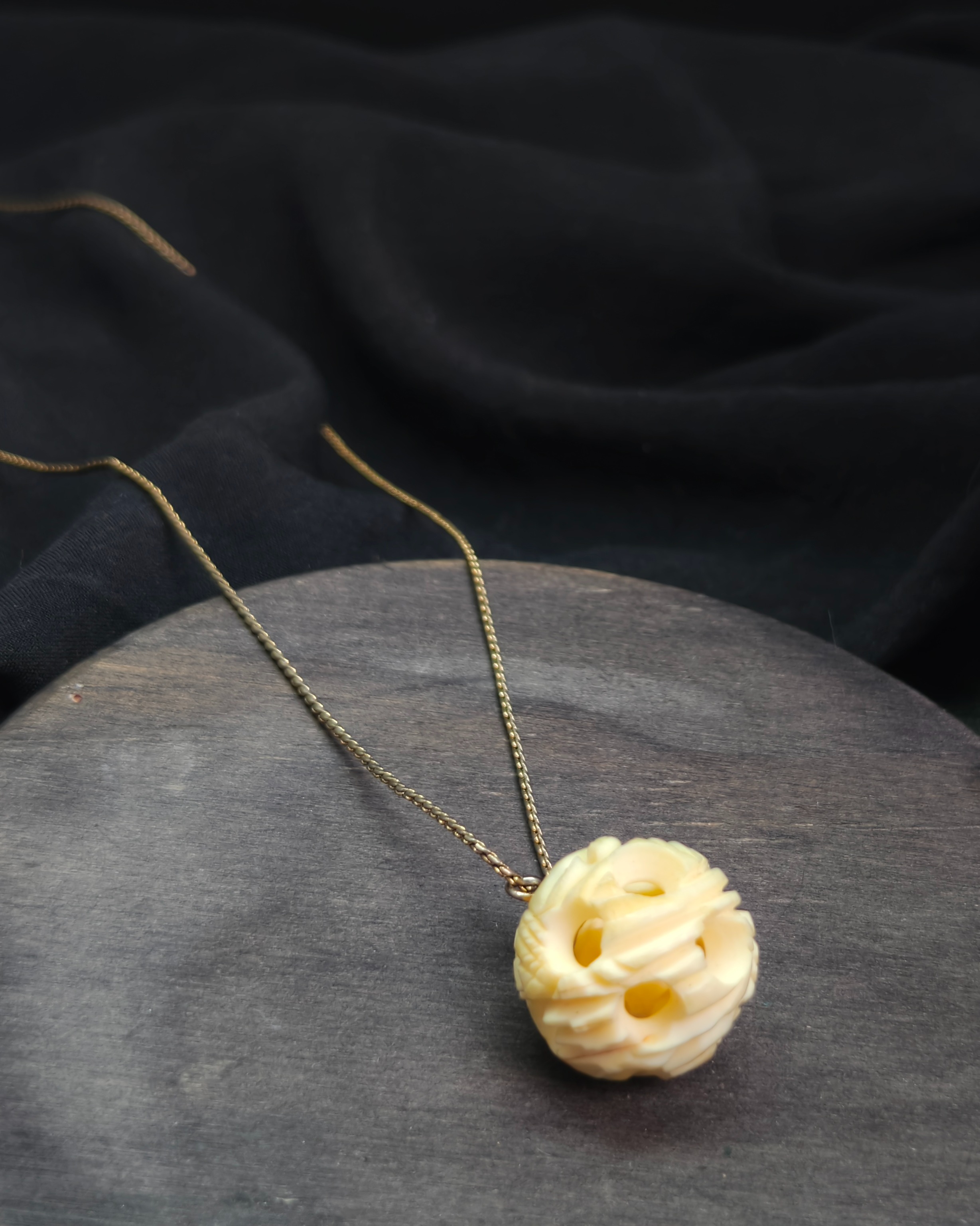Necklace with double concentric bone sphere (alternate view)