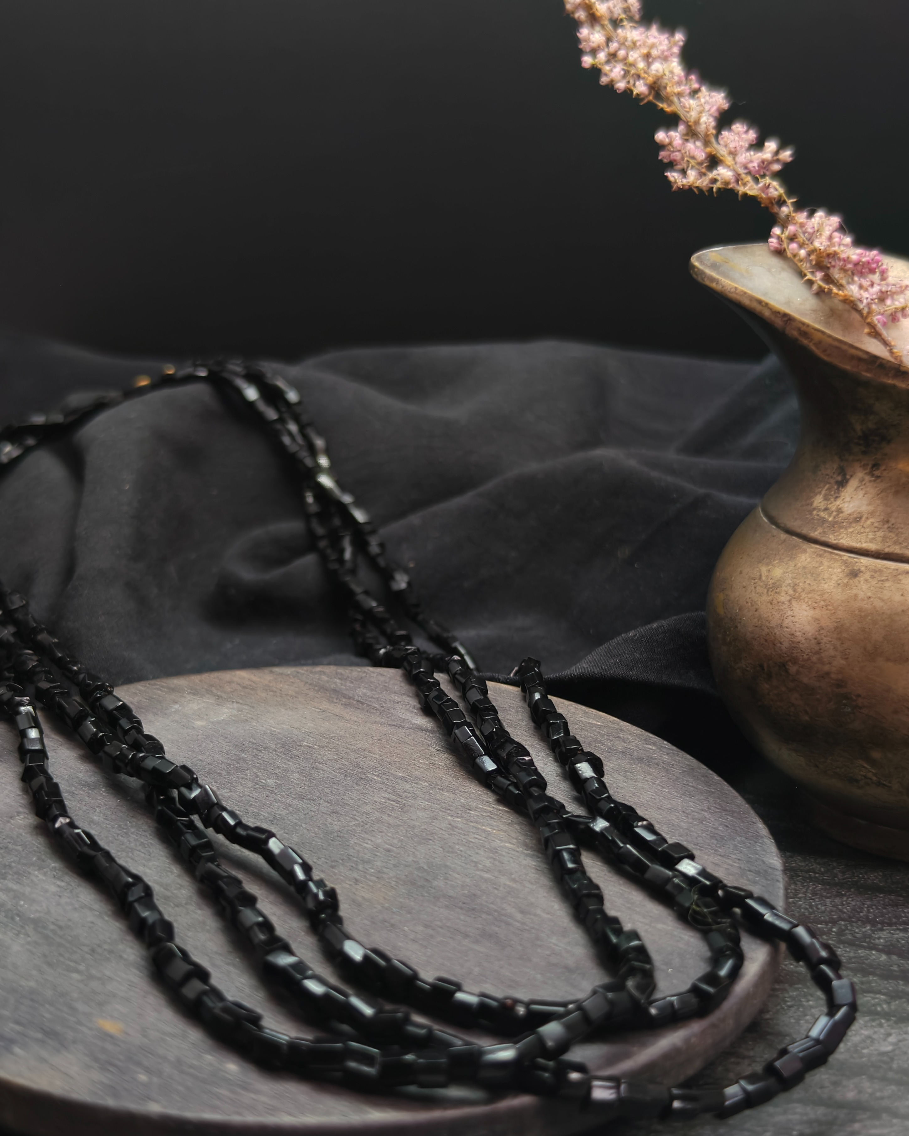 Long necklace with faceted black glass beads (alternate view)