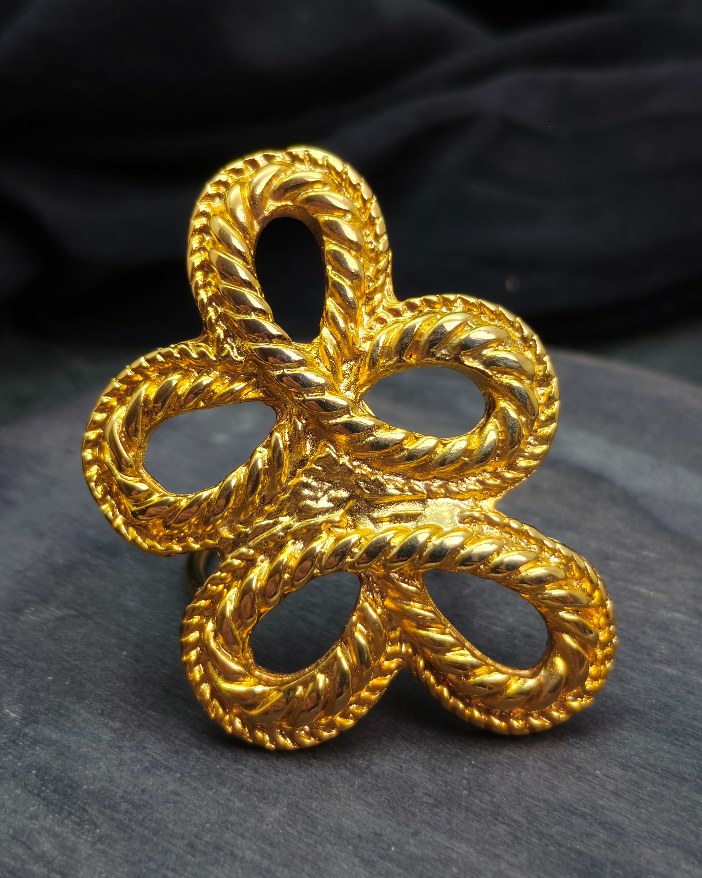 Gold tone Scarf clip of a twisted rope loop bow (c.1980) (alternate view)