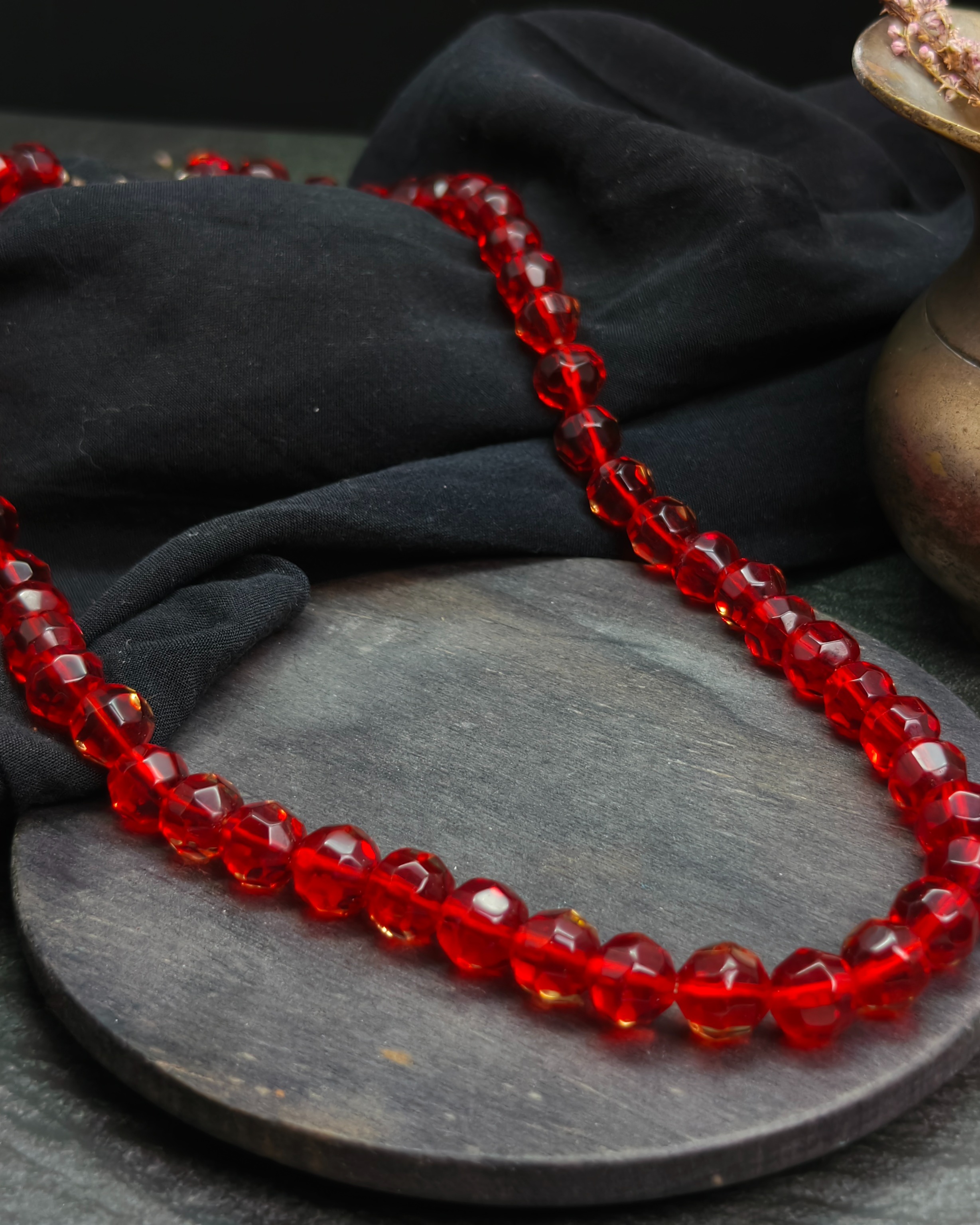 Necklace of red faceted crystal beads