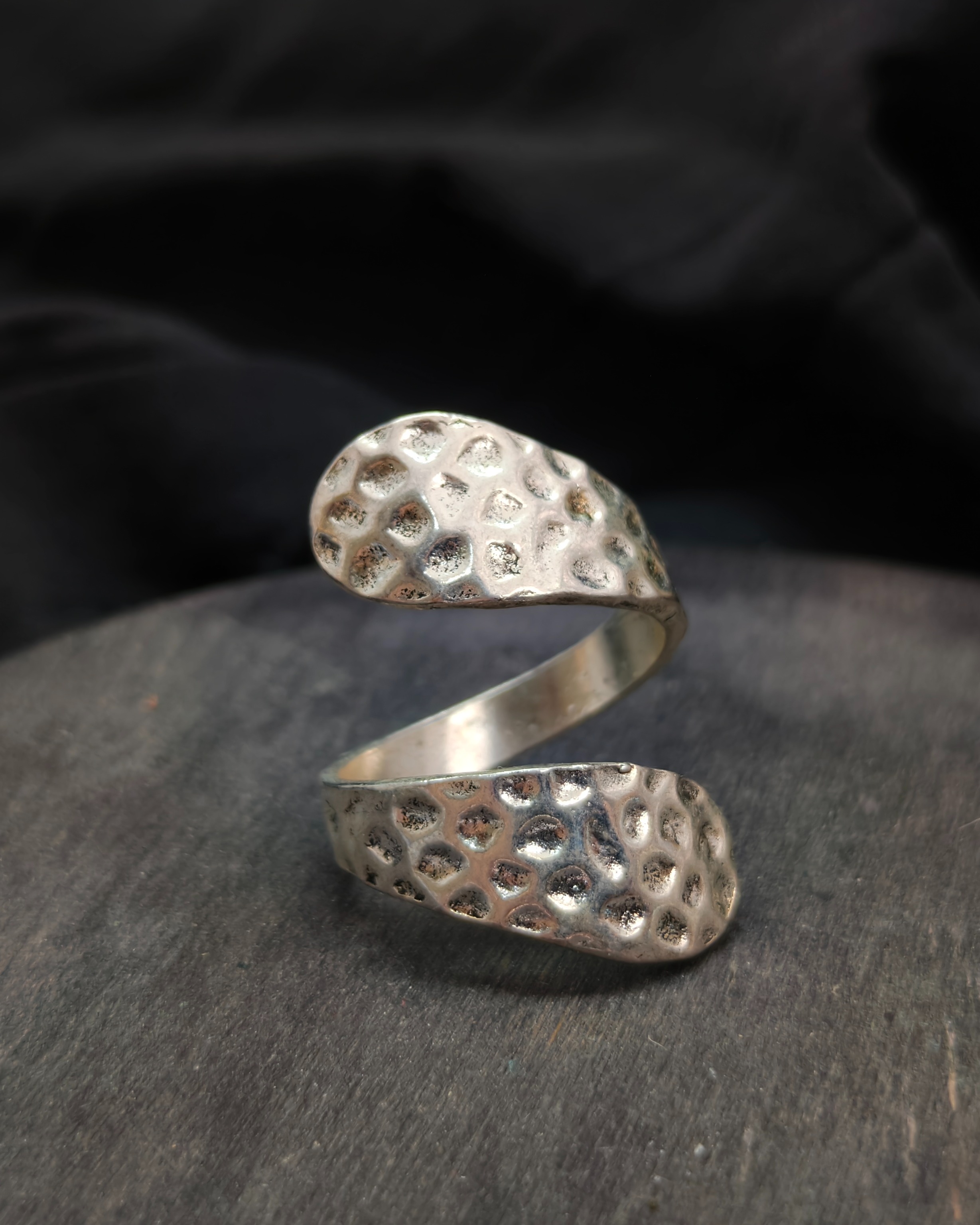 Double helix riveted ring