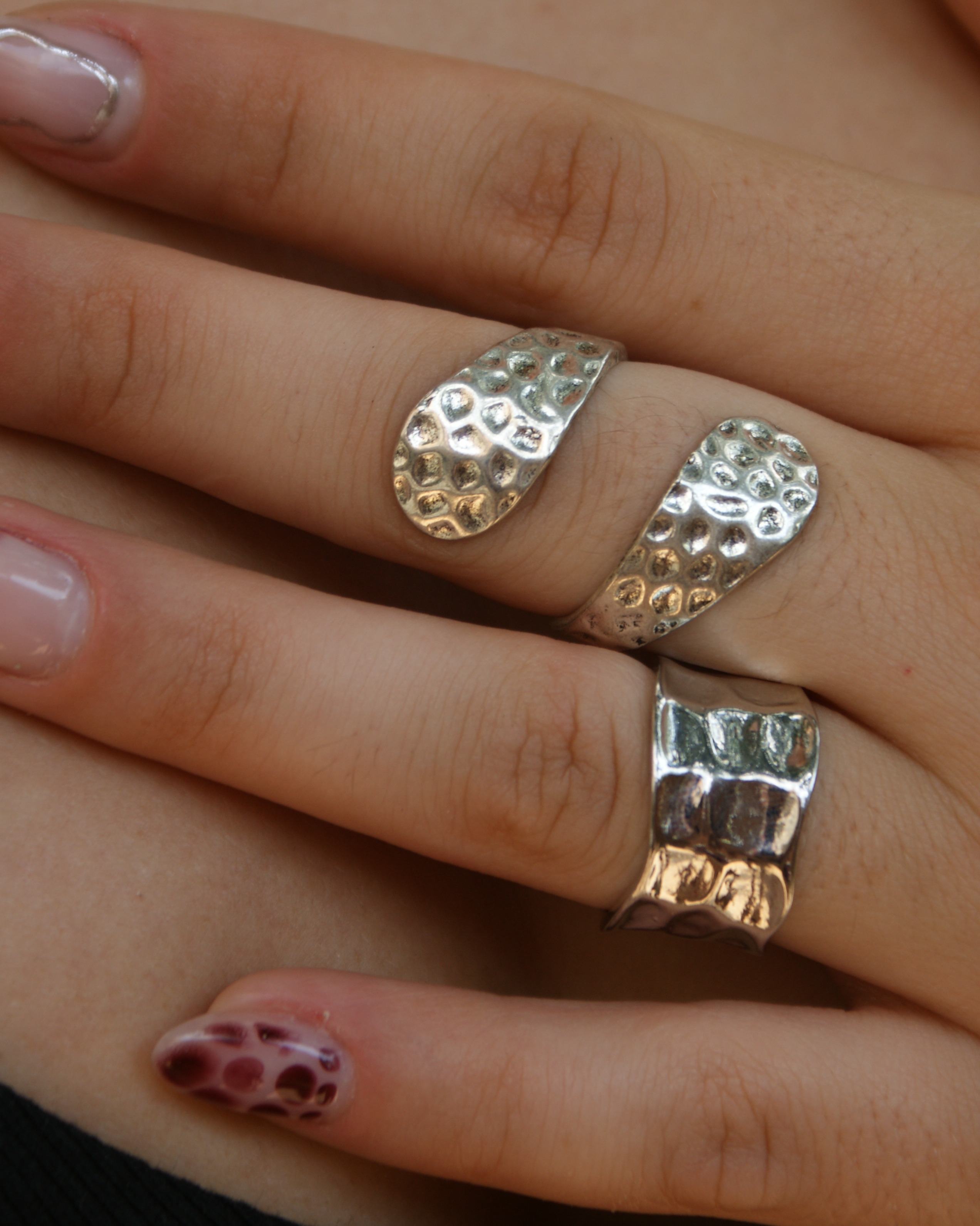 Double helix riveted ring (alternate view)