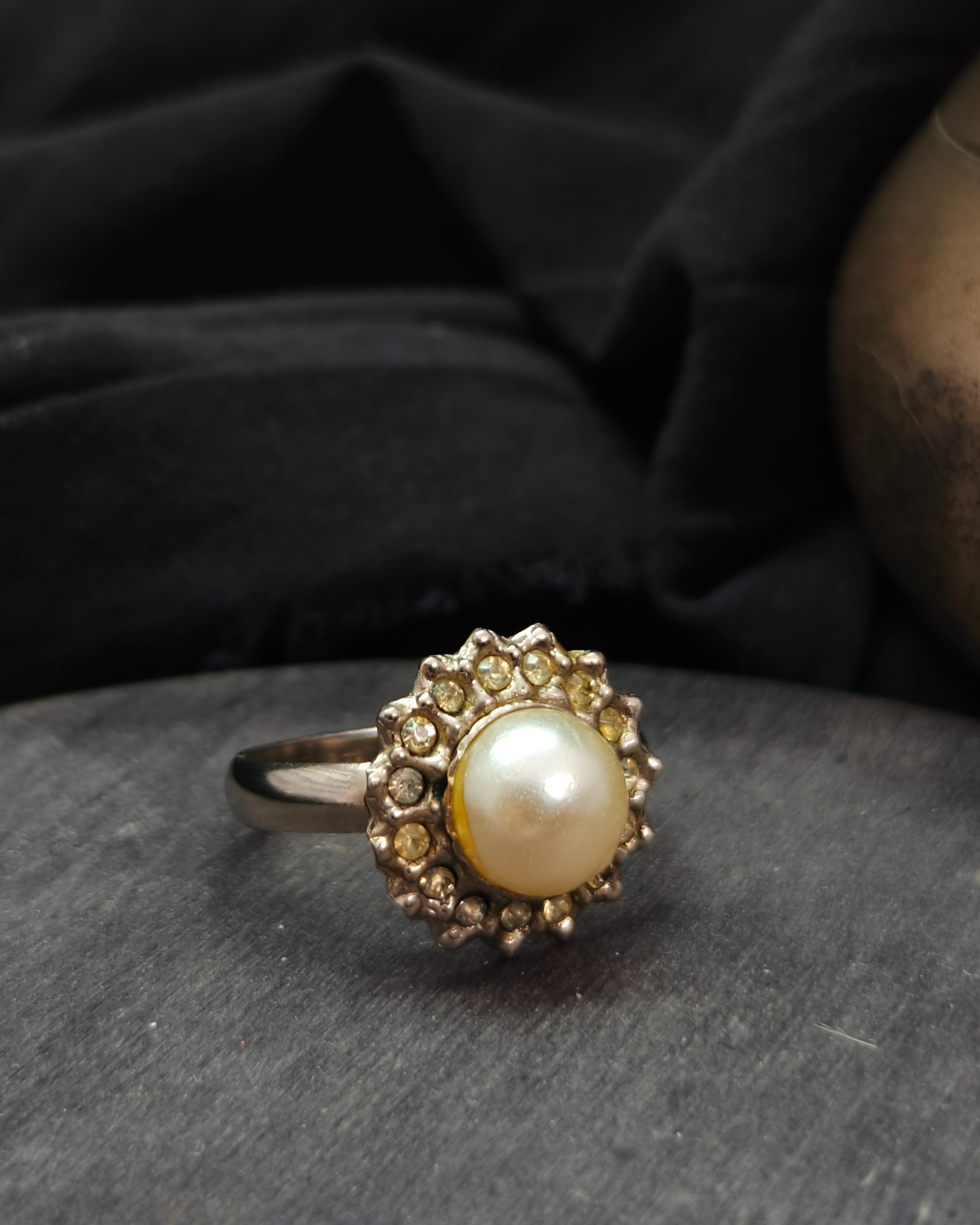 Rosette style cocktail ring with central pearl