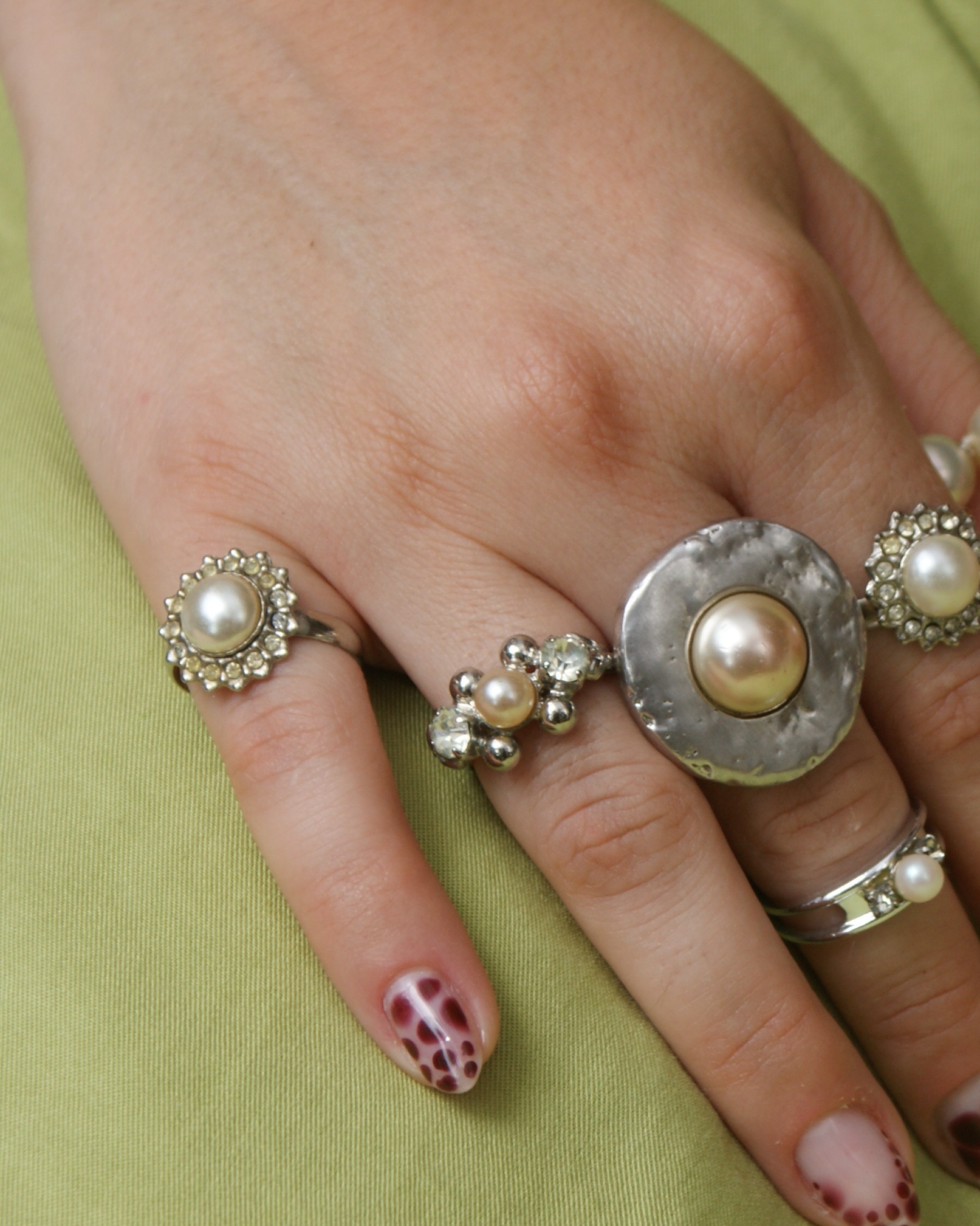 Rosette style cocktail ring with central pearl (alternate view)
