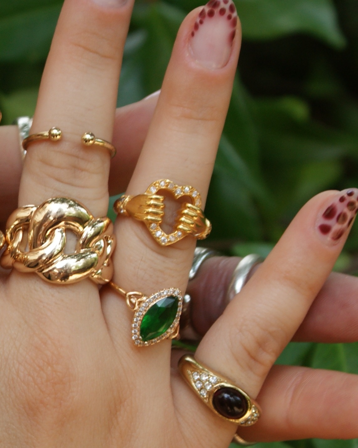 18k gold ring with hands, heart, and cubic zirconia (alternate view)