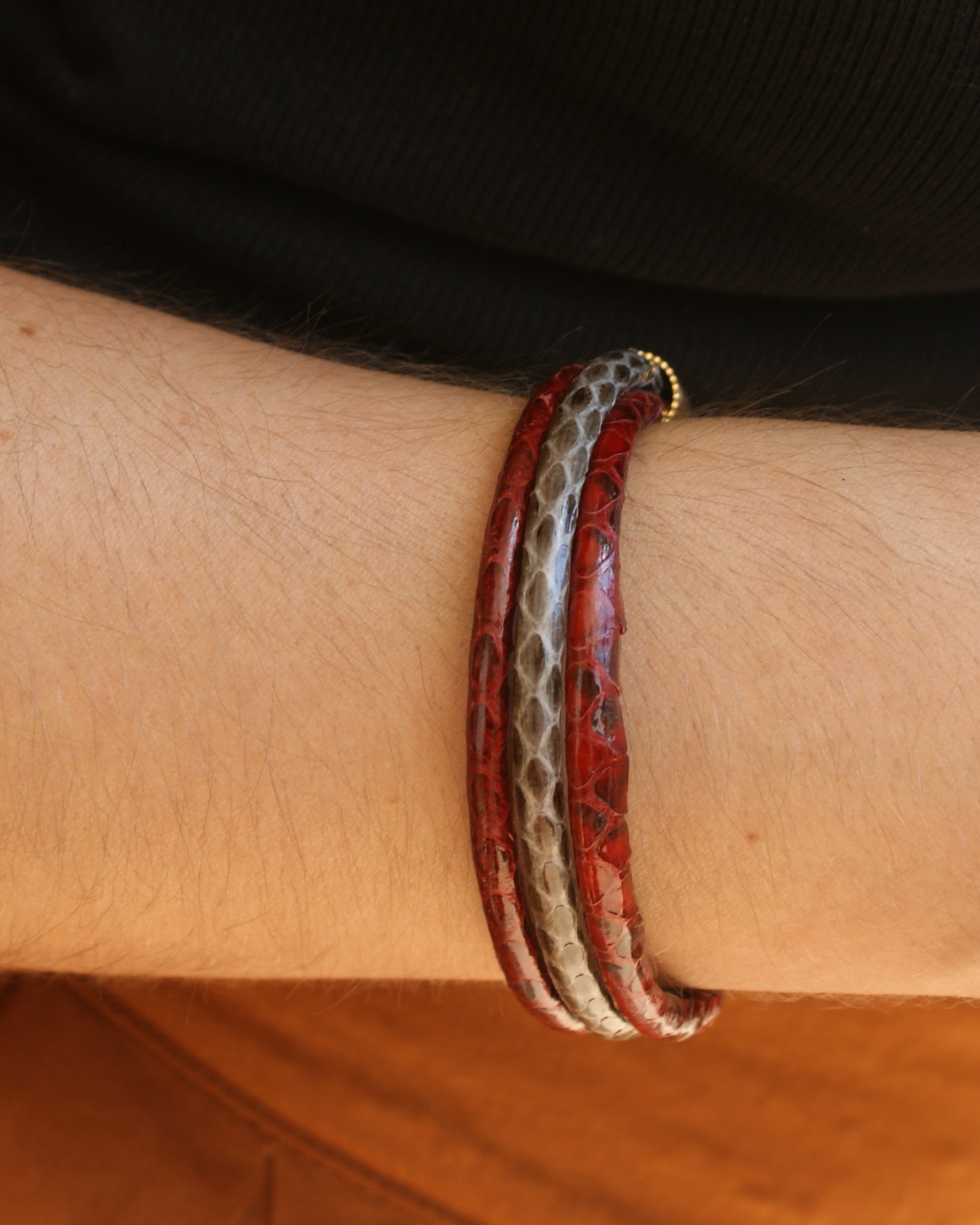 Red bracelet with snakeskin effect (alternate view)